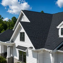 Suburban home with a newly installed dark shingle roof